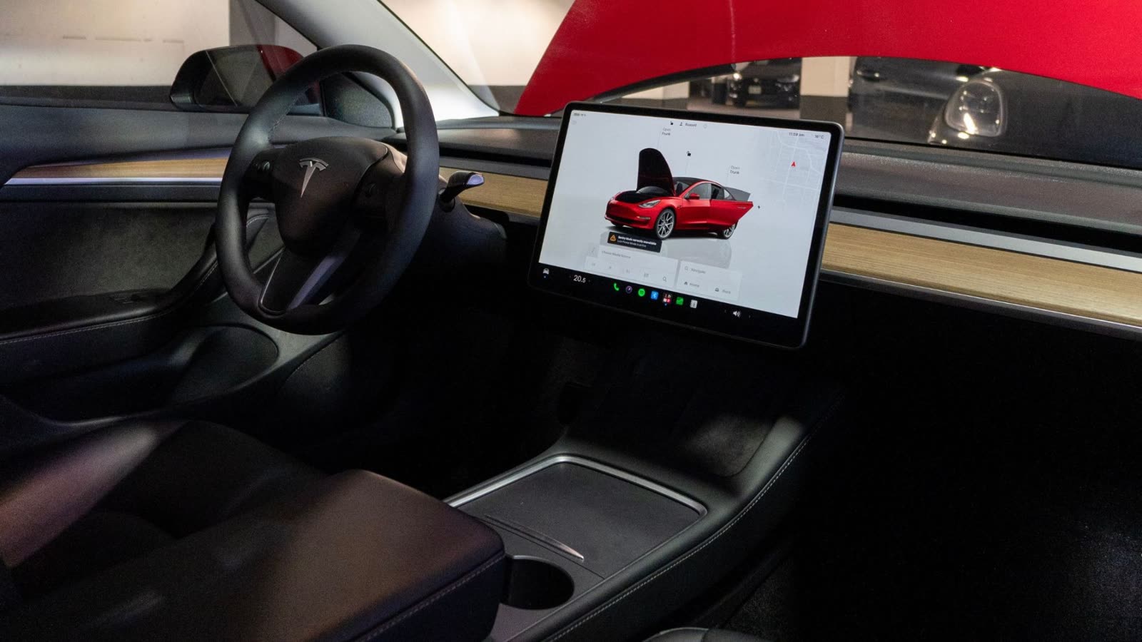 An electric car interior cleaned by ALPHASHINE car detailing, operating in downtown Toronto with 3 locations.