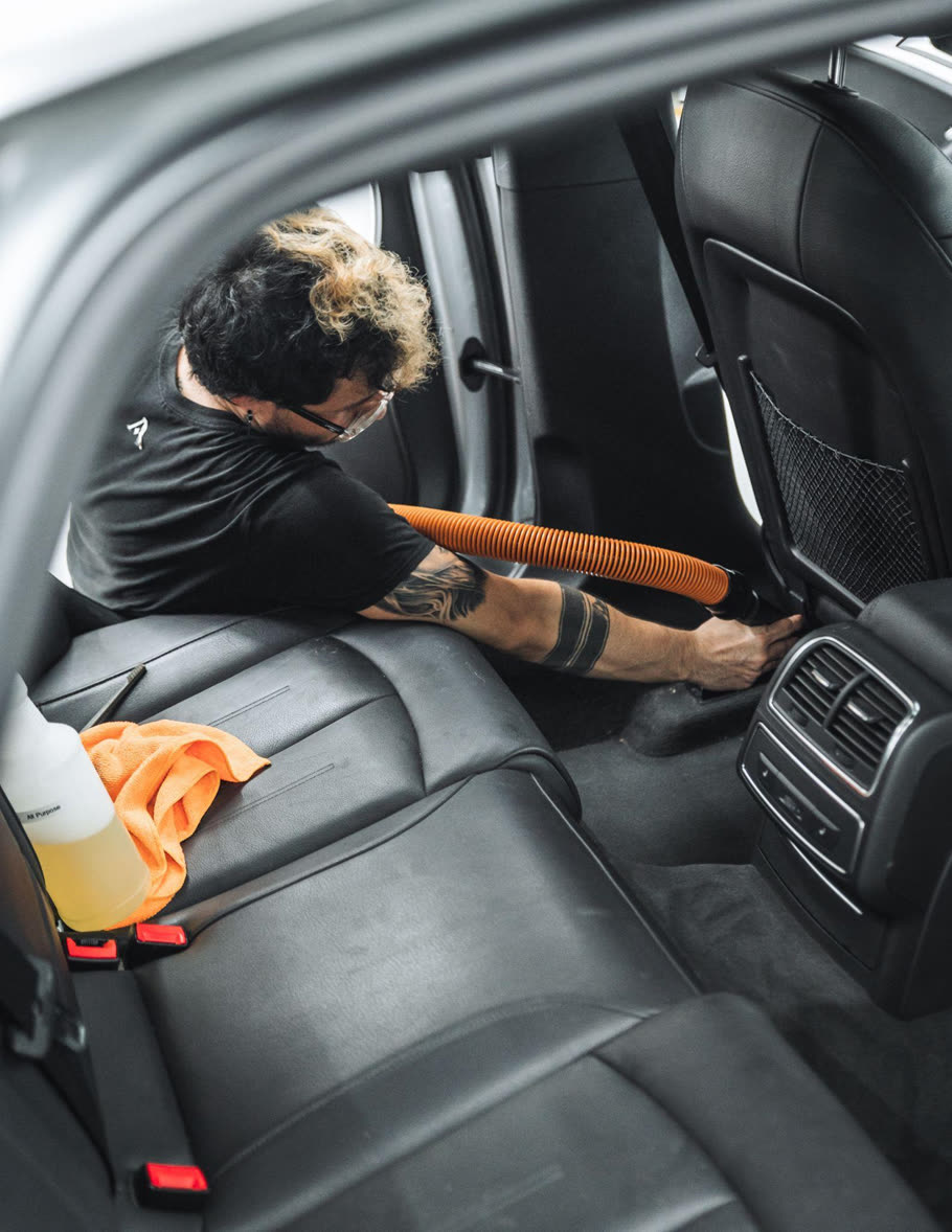 Car detailing meticulously restores the vehicle's appearance and protects its surfaces